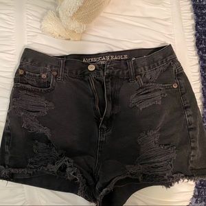 black ripped jean shorts